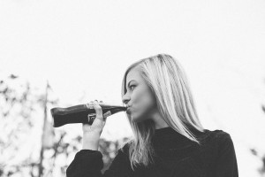 woman drinking fizzy drink